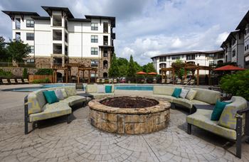 Pool area with fire pit at 4700 colonnade apartments in birmingham, al